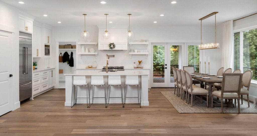 Light spacious kitchen with granite countertops