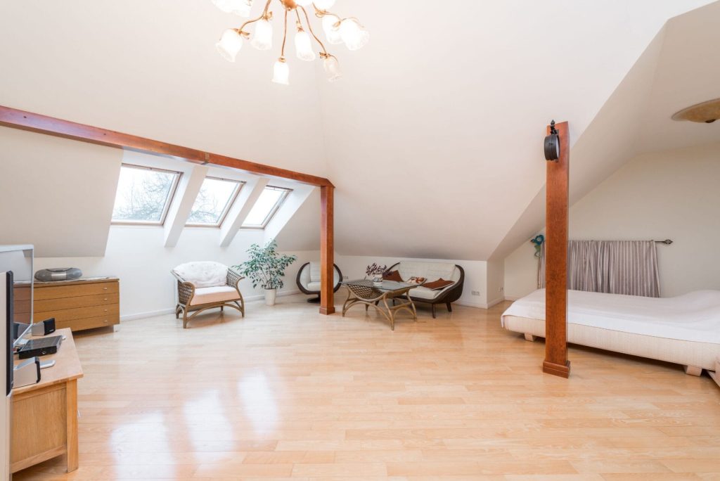 Above garage space transformed into a spacious and light living room